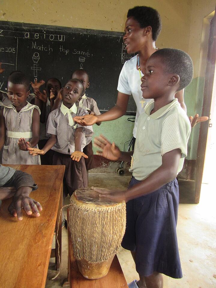 Dan, a student in Top Class at St. Anthony Nursery School, practices playing a drum. St. Anthony is another school in the CARITAS child sponorship programs where one can sponsor a child. Dan, a student in Top Class at St. Anthony Nursery School, practices playing a drum. St. Anthony is another school in the CARITAS child sponorship programs where one can sponsor a child.