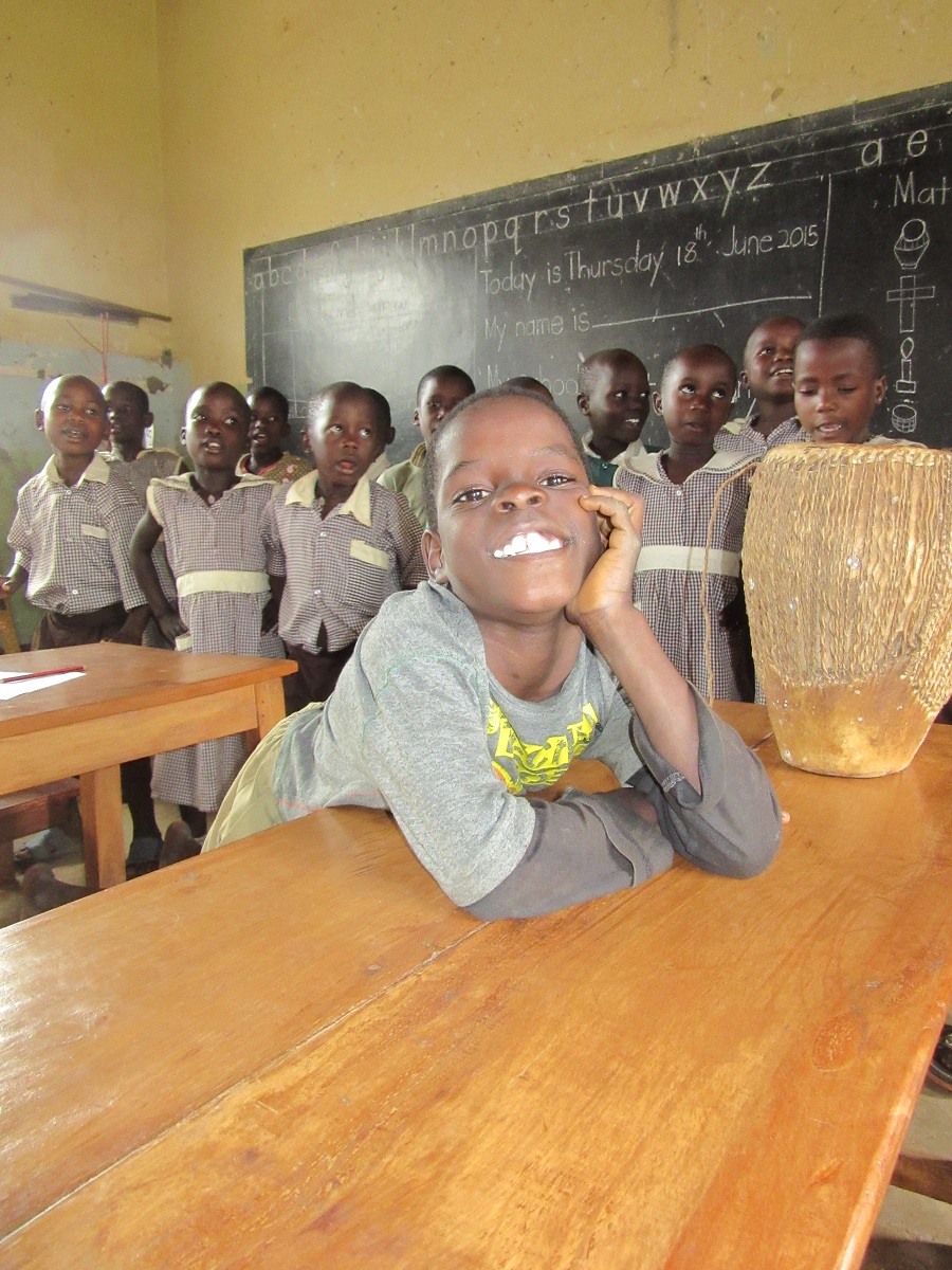 Solomon smiles from his desk in Top Class, the most advanced class at St. Anthony Nursery School. Solomon smiles from his desk in Top Class, the most advanced class at St. Anthony Nursery School.